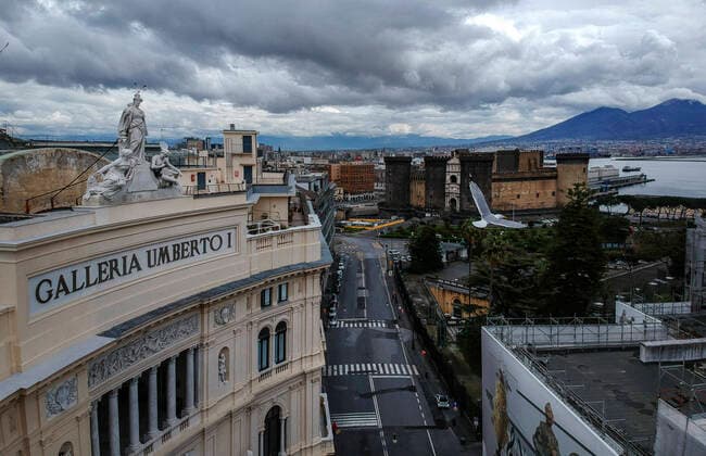 View of the empty street in Naples city, on backgound the Maschio Angioino Castle and Vesuvius, after the Italian government has imposed unprecedented national restrictions on controlling the coronavirus COVID-19.  Copyright: xSalvatorexLaportax xIPAx xKontrolabx