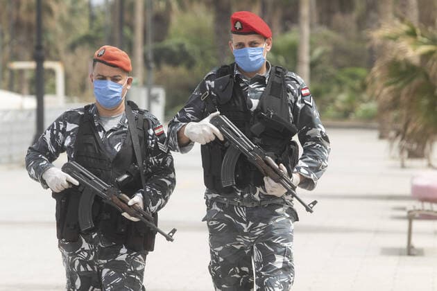 Lebanese armed police wearing protective face masks against COVID-19 patrol Beirut seafront to prevent public gatherings as Beirut goes into lockdown to stop the spread of coronavirus disease Where: Beirut, Lebanon When: 27 Mar 2020 Credit: Amer Ghazzal Cover Images Copyright: xx 40413275 EDITORIAL USE ONLY. NOT FOR USE BY NEWSPAPERS BASED IN THE UK.