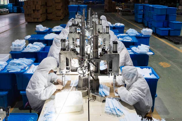 (200327) -- XIANGYANG, March 27, 2020 -- Workers make face masks at a workshop in Xiangyang City, central China s Hubei Province, March 27, 2020. Amid stringent prevention measures against the virus, the companies of medical protective equipment production in Xiangyang introduced several production lines of protective gear, such as face masks and protective suits, which are not only used at home, but also exported abroad to help the fight against the COVID-19 globally. ) CHINA-HUBEI-XIANGYANG-MEDICAL SUPPLIES-PRODUCTION (CN) XiexJianfei 