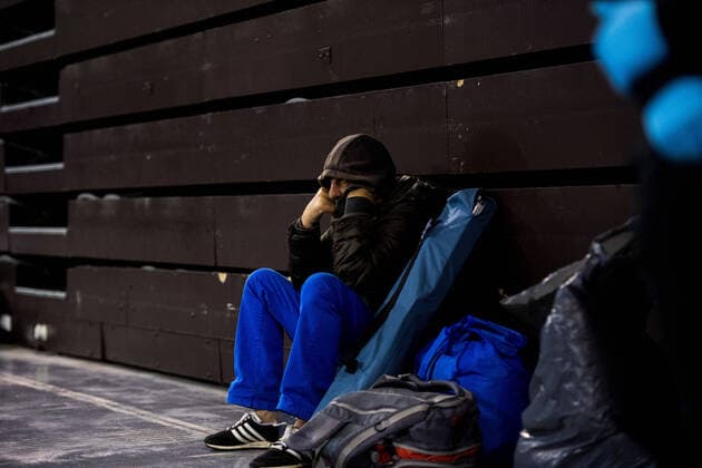 March 27, 2020, Granada, Spain: A homeless person inside the pavilion of the Sports Palace in Granada during the state of emergency..The homeless people of Granada have been transferred to the Sports Palace pavilion during the state of emergency decreed by the Spanish Government. In Spain there are more than 64,000 infected and almost 5,000 deaths by COVID-19. Granada Spain - ZUMAs197 20200327_zaa_s197_061 Copyright: xCarlosxGilx