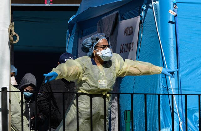 March 27, 2020, New York Queens, USA: nurse in front the Elmhurst Hospital Coronavirus test Center. At least 13 patients died from coronavirus over 24 hours at a New York Elmhurst Hospital . . 03 27 20. New York Queens. . New York Queens. USA - ZUMAs252 20200327_znp_s252_007 Copyright: xMarcusxSantosx