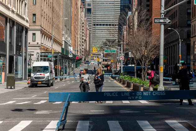 New York during the COVID-19 pandemic People take advantage of the closed to traffic Park Avenue in New York on Friday, March 27, 2020. To take pressure off the parks New York has closed four streets, one each in Manhattan, Brooklyn, Queens and the Bronx, to vehicular traffic so people can take a walk while social distancing. (  RichardxB.xLevine
