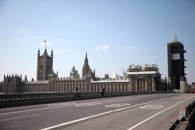 The street near Parliament is empty after Prime Minister Boris Johnson imposed a national lockdown from the rapidly spreading Coronavirus Pandemic, in London on Friday, March 27, 2020. Prime Minister Boris Johnson announced today that he is self-isolating after testing positive for the coronavirus.  LON2020032709 HUGOxPHILPOTT