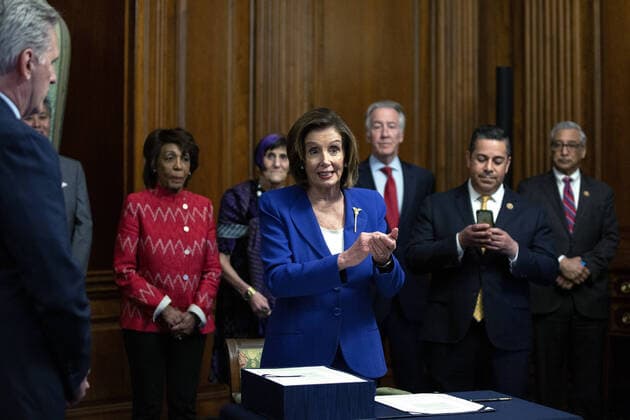 Speaker of the House Nancy Pelosi speaks during a signing ceremony after the House passed the $2.2 trillion CARES Act at the U.S. Capitol on Friday, March 27, 2020 in Washington, D.C. The stimulus bill, the largest in U.S history, provides economic bailouts to companies, independent contractors and includes direct payments to individuals as the U.S. suffers from the COVID-19 pandemic.  WAP202003278039 STEFANIxREYNOLDS