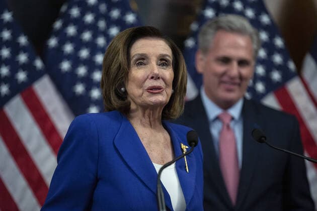 Speaker of the House Nancy Pelosi speaks during a signing ceremony after the House passed the $2.2 trillion CARES Act at the U.S. Capitol on Friday, March 27, 2020 in Washington, D.C. The stimulus bill, the largest in U.S history, provides economic bailouts to companies, independent contractors and includes direct payments to individuals as the U.S. suffers from the COVID-19 pandemic.  WAP202003278029 STEFANIxREYNOLDS