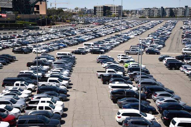 Hundreds of rental cars seen park at Anaheim Stadium Thursday, March 27,2020. Anaheim, CA USA. Due to the COVID-19 it appears that part of the ballpark property has been turned into a huge rental car storage lot as the rental business dries up during the pandemic. Anaheim USA - ZUMAbl1_ 20200327_zaf_bl1_025 Copyright: xGenexBlevinsx