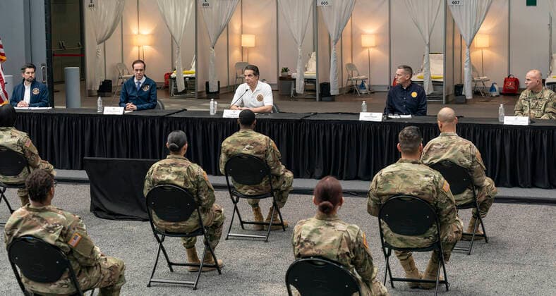 NY: Andrew Cuomo addresses National Guard members Governor Andrew Cuomo addresses National Guard members and media praising complition of makeshift hospitals at Jacob Javits Center New York New York United States Copyright: LevxRadin