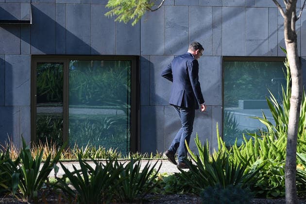 DANIEL ANDREWS CORONAVIRUS PRESSER, Victorian Premier Daniel Andrews leaves after a press conference at Parliament House in Melbourne, Saturday, March 28, 2020. ( NO ARCHIVING, EDITORIAL USE ONLY, NO USE IN BOOKS WITHOUT CONSENT MELBOURNE VIC AUSTRALIA  Copyright: xERIKxANDERSONx 20200328001460531881