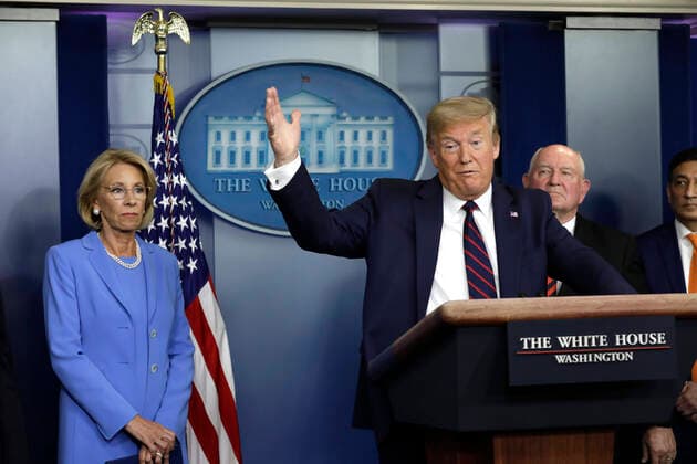 March 27, 2020, Washington, District of Columbia, USA: United States President Donald J. Trump speaks between US Secretary of Education Betsy DeVos, left, and US Secretary of Agriculture Sonny Perdue, right center, and Panera Bread CEO Niren Chaudhary, right, during a press briefing on the Coronavirus COVID-19 pandemic with members of the Coronavirus Task Force at the White House in Washington, DC on March 27, 2020. .Credit: Pool via CNP Washington USA - ZUMAs152 20200327_zaa_s152_077 Copyright: xYurixGripasx
