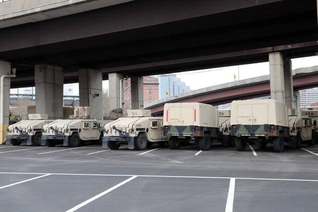 BALTIMORE, MD - MARCH 27: View of parked military vehicles during the coronavirus pandemic in Baltimore, Maryland on March 27, 2020. Copyright: xmpi34x
