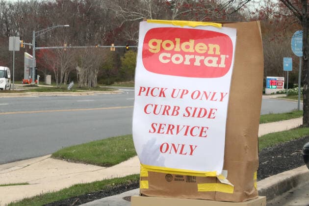 BALTIMORE, MD - MARCH 27: View of a Golden Corral sign offering curb side pick up only during the coronavirus pandemic in Baltimore, Maryland on March 27, 2020. Copyright: xmpi34x