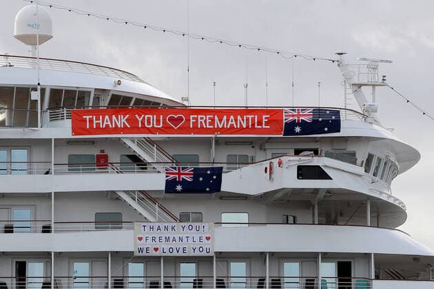 COVID-19 CRUISE PASSENGERS PERTH, Banners are hung from the cruise ship MV Artania in Fremantle harbour in Fremantle, Saturday, March 28, 2020. Nine people confirmed or suspected of being infected with coronavirus have disembarked from the MV Artania cruise ship and will be treated in Perth. None of the 800 passengers or 500 crew onboard are Australian, with the majority coming from Germany.( NO ARCHIVING, EDITORIAL USE ONLY, NO USE IN BOOKS WITHOUT CONSENT PERTH WA AUSTRALIA  Copyright: xRICHARDxWAINWRIGHTx 20200328001460577969