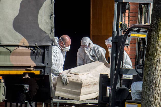 Seriate. Bergamo. Army medical staff clears the coffins in the church of San Giuseppe in Seriate and transports them with the use of five Army trucks killed by COVID19 Coronavirus (Carlo Cozzoli Fotogramma, Seriate - 2020-03-28) p.s. la foto e utilizzabile nel rispetto del contesto in cui e stata scattata, e senza intento diffamatorio del decoro delle persone rappresentate  Copyright: xCarloxCozzolix xFOTOGRAMMAx