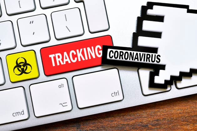FOTOMONTAGE, Computertaste mit der Aufschrift Tracking und BiogefÃ¤hrdungszeichen, Symbolfoto fÃ¼r Coronavirus-Apps