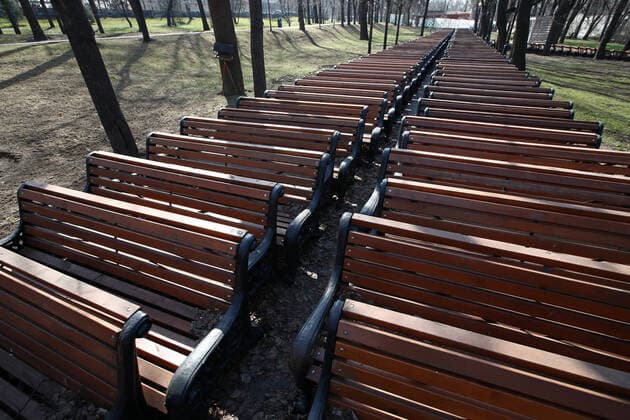 MOSCOW, RUSSIA - MARCH 28, 2020: Rows of empty benches at Moscow s Gorky Central Park closed from March 28 to April 5 as part of preventive measures against the spread of the COVID-19 infection. The novel coronavirus outbreak took place in Central China in December 2019 and went on to spread to over 160 countries causing the World Health Organisation to declare it a pandemic. Sergei Fadeichev TASS  TS0D3B63