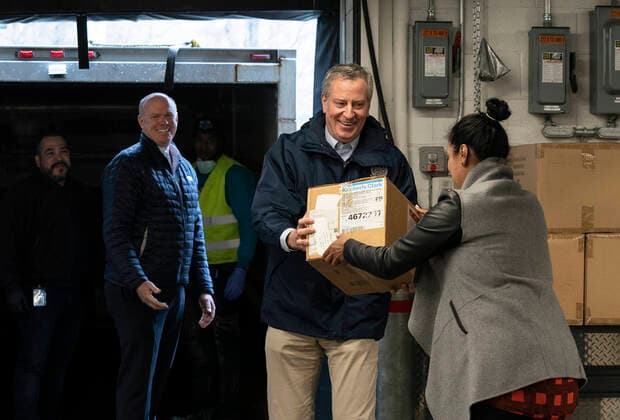 NY: UN donation of facial masks to fight COVID-19 Mayor Bill de Blasio helps load boxes of facial masks donated by UN Secretary-General Antonio Guterres & US Ambassador Kelly Craft at UN garage New York New York United States Copyright: LevxRadin