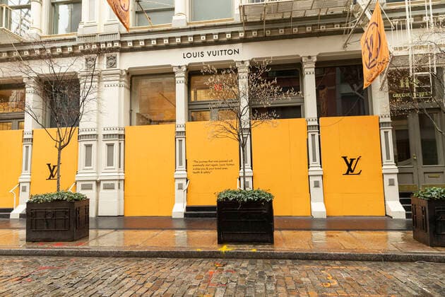 Sightseeing in New York City in times of COVID-19 Some high end stores like Louis Vuitton on Greene Street boarding up with plywood windows and entrances to prevent looting in Manhattan New York New York United States Copyright: LevxRadin