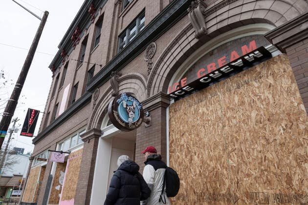 March 28, 2020, Seattle, Washington, U.S: Businesses are boarded up in SeattleÃ¢â‚¬â ¢s thriving Capitol Hill neighborhood on Saturday, March 28, 2020. Governor Jay InsleeÃ¢â‚¬â ¢s executive order mandated the closer of non-essential business as of March 25 to in an effort to limit the spread of the COVID-19 virus. Seattle U.S. - ZUMAg235 20200328_zap_g235_012 Copyright: xPaulxChristianxGordonx