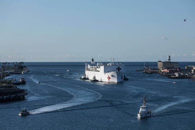 March 29, 2020, Los Angeles, California, United States Of America: LOS ANGELES, CA - MARCH 27: The Military Sealift Command hospital ship USNS Mercy (T-AH 19) arrives in Los Angeles, Calif., March 27, 2020. Mercy deployed in support of the nationâ€⠢s COVID-19 response efforts, and will serve as a referral hospital for non-COVID-19 patients currently admitted to shore-based hospitals. This allows shore base hospitals to focus their efforts on COVID-19 cases. One of the Department of Defenseâ€⠢s missions is Defense Support of Civil Authorities. DOD is supporting the Federal Emergency Management Agency, the lead federal agency, as well as state, local and public health authorities in helping protect the health and safety of the American people on March 27, 2020 in Los Angeles, California..People: USNS Mercy Los Angeles United St - ZUMAn287 20200329_zaa_n287_006 Copyright: xSMGx
