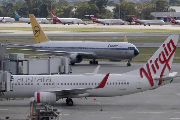 COVID-19 CRUISE PASSENGERS PERTH, The first Condor Airlines aircraft arrives at Perth International airport on Sunday, March 29, 2020. Four Condor Airlines charter flights are arriving from Frankfurt in Germany via Phuket in Thailand to repatriate passengers from the coronavirus-infected cruise ship MS Artania which docked in Fremantle harbour on Friday with approximately 800 passengers, mostly from Germany and 500 crew on board. Nine passengers and crew from the vessel have tested positive for coronavirus and were taken to hospitals in Perth. Another 46 people were showing virus-type symptoms. ( NO ARCHIVING, EDITORIAL USE ONLY, NO USE IN BOOKS WITHOUT CONSENT PERTH WA AUSTRALIA  Copyright: xRICHARDxWAINWRIGHTx 20200329001460691282