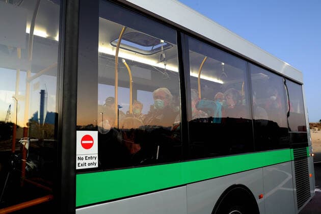 COVID-19 CRUISE PASSENGERS PERTH, Passengers from the cruise ship MS Artania are seen arriving at Perth International airport on TransPerth buses before boarding a Condor Airlines charter flight back to Germany on Sunday, March 29, 2020. Four Condor Airlines charter flights are scheduled to arrive from Frankfurt in Germany via Phuket in Thailand to repatriate passengers from the coronavirus-infected cruise ship MS Artania which docked in Fremantle harbour on Friday with approximately 800 passengers, mostly from Germany and 500 crew on board. Nine passengers and crew from the vessel have tested positive for coronavirus and were taken to hospitals in Perth. Another 46 people were showing virus-type symptoms. ( NO ARCHIVING, EDITORIAL USE ONLY, NO USE IN BOOKS WITHOUT CONSENT PERTH WA AUSTRALIA  Copyright: xRICHARDxWAINWRIGHTx 20200329001460703512