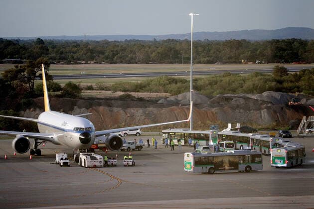 COVID-19 CRUISE PASSENGERS PERTH, Passengers from the cruise ship MS Artania are seen boarding the first Condor Airlines charter aircraft heading back to Frankfurt in Germany at Perth International airport on Sunday, March 29, 2020. Four Condor Airlines charter flights are scheduled to arrive from Frankfurt in Germany via Phuket in Thailand to repatriate passengers from the coronavirus-infected cruise ship MS Artania which docked in Fremantle harbour on Friday with approximately 800 passengers, mostly from Germany and 500 crew on board. Nine passengers and crew from the vessel have tested positive for coronavirus and were taken to hospitals in Perth. Another 46 people were showing virus-type symptoms. ( NO ARCHIVING, EDITORIAL USE ONLY, NO USE IN BOOKS WITHOUT CONSENT PERTH WA AUSTRALIA  Copyright: xRICHARDxWAINWRIGHTx 20200329001460704046