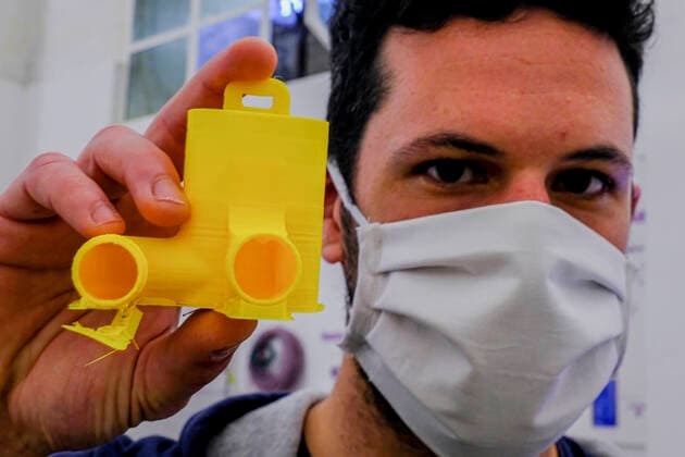 Raniero Madonna holds an adapter to transform a snorkelling mask distributed by Decathlon into an oxygen surgery mask to improve care for Sars-Cov2 patients seriously ill in Italians hospitals in Remade 3D graphics laboratory that participate to a project made by Isinnova who shared his idea. In Italy hospitals are almost full and more intensive care equipment is needed.  Copyright: xAntonioxBalascox xIPAx xAntonioxBalascox