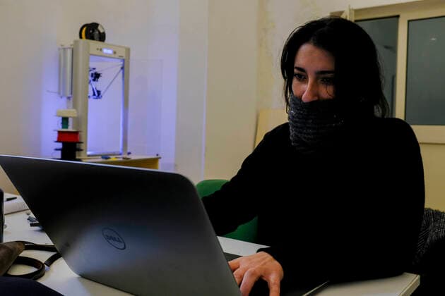 Susanna Parlato works on a laptop to realize an adapter to transform a snorkeling mask distributed by Decathlon in an oxygen surgery mask to improve the cares for Sars-Cov2 seriously ill in Italians hospitals in Remade 3D graphics laboratory that participate to a project made by Isinnova who shared his idea. In Italy hospitals are almost full and more intensive care equipment is needed.  Copyright: xAntonioxBalascox xIPAx xAntonioxBalascox
