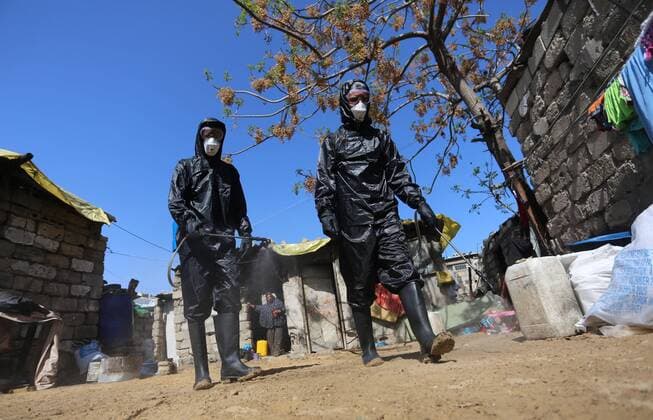 March 29, 2020, Khan Younis, Gaza Strip, Palestinian Territory: Palestinian workers spray disinfectant as a preventive measure amid fears of the spread of the coronavirus at Nahr al-Bared refugee camp in Khan Younis in the southern Gaza Strip on March 29, 2020 Khan Younis Palestinian Territory - ZUMAap3_ 20200329_zaf_ap3_060 Copyright: xAshrafxAmrax