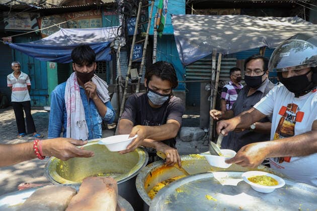 India: Jobless during the complete lockdown Some people are jobless during the complete lockdown in the entire country due to the pandemic COVID19. Some of the government and non government welfare organisations donating food to those people who live in the streets and who are not able to earn during this situations. Delivery service of food and medicines are also available. Electrical department is also working and handling the power cut situations during the lockdown phase. Kolkata West Bengal India Copyright: JitxChattopadhyay