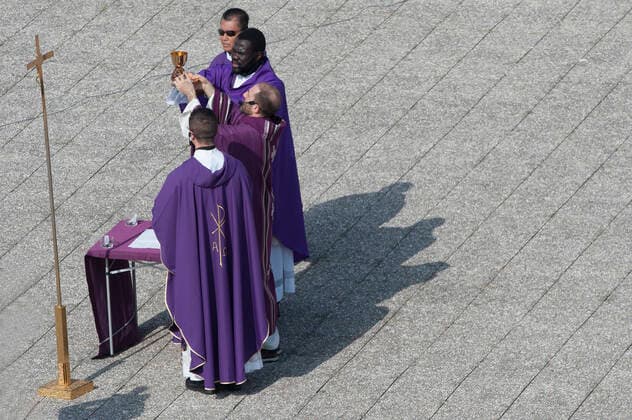 NO FRANCE - NO SWITZERLAND: March 29, 2020 : Four priests celebrate the Sunday Holy Mass from the roof of the church San Gabriele dell Addolorata in Rome , amid the spread of the COVID-19 (new coronavirus) pandemic  Copyright: x& xa9;AlessiaxGiuliani CPPx xIPAx x& xa9;CatholicxPressxPhotox