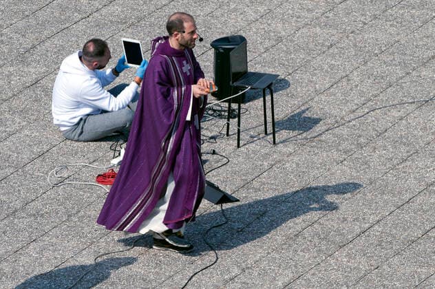 NO FRANCE - NO SWITZERLAND: March 29, 2020 : Four priests celebrate the Sunday Holy Mass from the roof of the church San Gabriele dell Addolorata in Rome , amid the spread of the COVID-19 (new coronavirus) pandemic  Copyright: x& xa9;AlessiaxGiuliani CPPx xIPAx x& xa9;CatholicxPressxPhotox