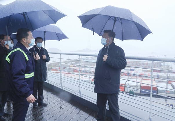 (200329) -- NINGBO, March 29, 2020 -- Chinese President Xi Jinping, also general secretary of the Communist Party of China Central Committee and chairman of the Central Military Commission, visits the Chuanshan port area of the Ningbo-Zhoushan Port in east China s Zhejiang Province, March 29, 2020. Xi on Sunday inspected the resumption of work and production in Zhejiang. ) CHINA-ZHEJIANG-XI JINPING-INSPECTION (CN) JuxPeng 