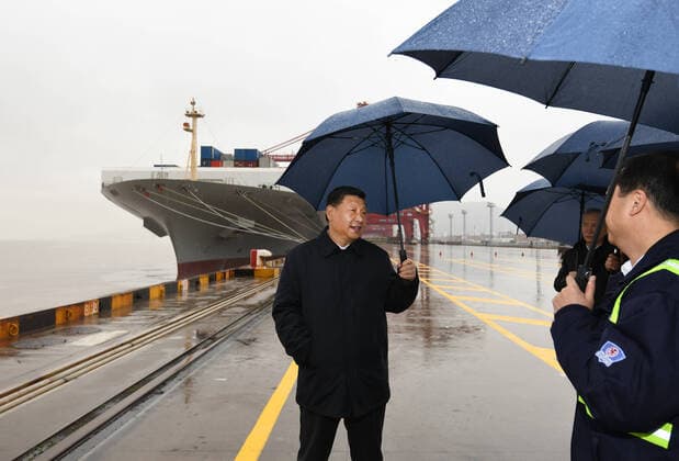 (200329) -- NINGBO, March 29, 2020 -- Chinese President Xi Jinping, also general secretary of the Communist Party of China Central Committee and chairman of the Central Military Commission, visits the Chuanshan port area of the Ningbo-Zhoushan Port in east China s Zhejiang Province, March 29, 2020. Xi on Sunday inspected the resumption of work and production in Zhejiang. ) CHINA-ZHEJIANG-XI JINPING-INSPECTION (CN) ShenxHong 