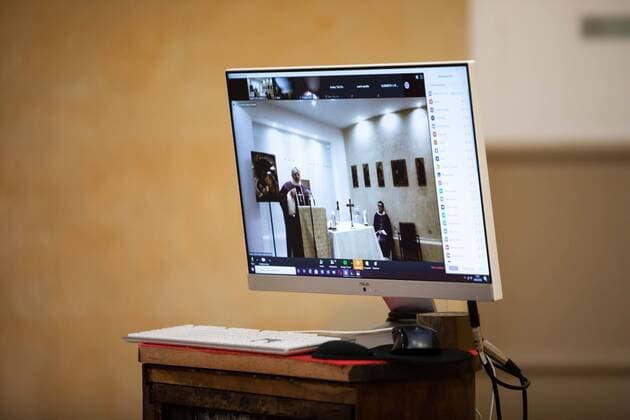 Paris, France, March 29, 2020 - Mass celebrated by videoconference during the Covid-19 epidemic inside the chapel of Sainte Odile church.  Copyright: xAlexisxSciardx