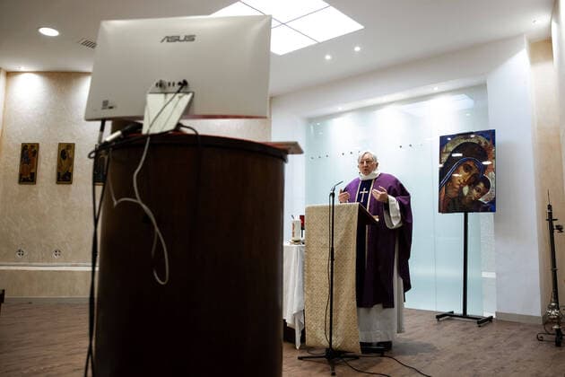 Paris, France, March 29, 2020 - Mass celebrated by videoconference during the Covid-19 epidemic inside the chapel of Sainte Odile church - In the presence of father Stephane Biaggi  Copyright: xAlexisxSciardx