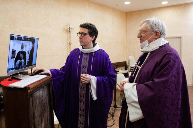 Paris, France, March 29, 2020 - Mass celebrated by videoconference during the Covid-19 epidemic inside the chapel of Sainte Odile church - In the presence of father Stephane Biaggi  Copyright: xAlexisxSciardx
