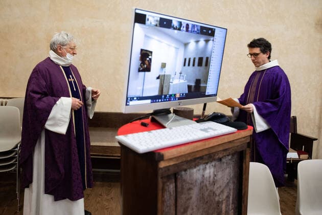 Paris, France, March 29, 2020 - Mass celebrated by videoconference during the Covid-19 epidemic inside the chapel of Sainte Odile church - In the presence of father Stephane Biaggi  Copyright: xAlexisxSciardx