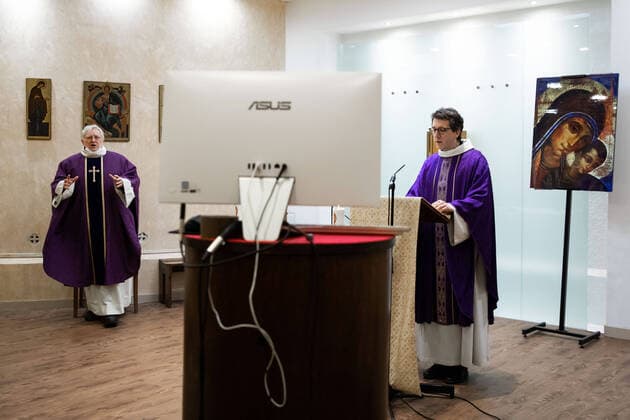 Paris, France, March 29, 2020 - Mass celebrated by videoconference during the Covid-19 epidemic inside the chapel of Sainte Odile church - In the presence of father Stephane Biaggi  Copyright: xAlexisxSciardx