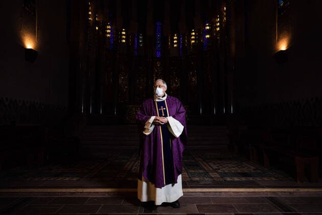 Paris, France, March 29, 2020 - Father Stephane Biaggi poses inside Sainte Odile church after celebrating a mass by videoconference during the Covid-19 epidemic.  Copyright: xAlexisxSciardx