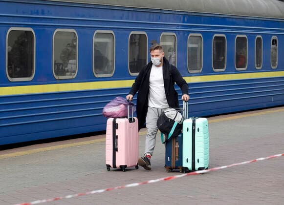 March 29, 2020, Kiev, Ukraine: A Ukrainian man from Russia leaves the special train after the evacuation..The special train from Kiev to Moscow evacuated Russian citizens to Moscow on 27 March 2020, and brought back Ukrainian citizens from Moscow to Kiev on 29 March 2020, after Ukrainian authorities shut the country s borders amid the spread of the COVID-19 coronavirus pandemic. Kiev Ukraine - ZUMAs197 20200329_zaa_s197_068 Copyright: xPavloxGoncharx
