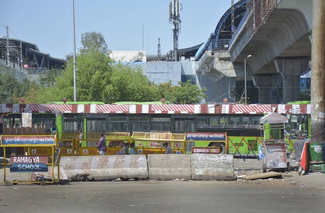 GHAZIABAD, INDIA - MARCH 29: Police barricades seen at Delhi - UP border after the Uttar Pradesh administration cancelled buses from ISBT Kaushambi due to a huge rush of migrant workers heading home, on Day 5 of the 21 day nationwide lockdown imposed by PM Narendra Modi to curb the spread of coronavirus, on March 29, 2020 in Ghaziabad, India. (Photo by Sakib Ali Hindustan Times ) Migrant Workers Head Home In Coronavirus Lockdown