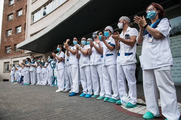 March 29, 2020, Madrid, MADRID, SPAIN: Details of the tribute to the Spanish health at 8 pm at the Hospital Universitario Fundacion Jimenez Diaz at the end of the second week after the Government declared the state of alarm in Spain and recommended people to stay at home to fight coronavirus COVID-19 on March 29, 2020 in Madrid, Spain Madrid SPAIN - ZUMAa181 20200329_zaa_a181_140 Copyright: xJoaquinxCorcherox