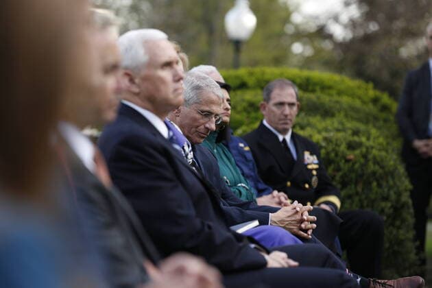March 29, 2020, Washington, District of Columbia, USA: Director of the National Institute of Allergy and Infectious Diseases at the National Institutes of Health Dr. Anthony Fauci and other members of the Coronavirus Task Force look on as United States President Donald J. Trump makes remarks as he begins his daily Coronavirus press conference in the Rose Garden of the White House in Washington, DC on Sunday, March 29, 2020 Washington USA - ZUMAs152 20200329_zaa_s152_011 Copyright: xStefanixReynoldsx