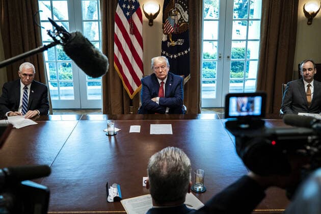 President Donald Trump meets with supply chain distributors in reference to the COVID-19 coronavirus pandemic, in the Cabinet Room in the West Wing at the White House in Washington, DC on Sunday, March 29, 2020. Pool photo by Pete Marovich  WAX20200329232 PETExMAROVICH