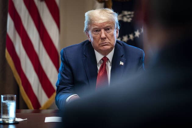 President Donald Trump meets with supply chain distributors in reference to the COVID-19 coronavirus pandemic, in the Cabinet Room in the West Wing at the White House in Washington, DC on Sunday, March 29, 2020. Pool photo by Pete Marovich  WAX20200329236 PETExMAROVICH