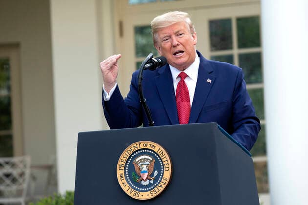 March 29, 2020, Washington, District of Columbia, USA: United States President Donald J. Trump delivers remarks on the COVID-19 pandemic in the Rose Garden of the White House in Washington D.C., U.S. on Sunday, March 29, 2020. Trump announced that restrictions related to the Coronavirus will be extended until April 30, 2020. Credit: CNP Washington USA - ZUMAs152 20200329_zaa_s152_039 Copyright: xStefanixReynoldsx