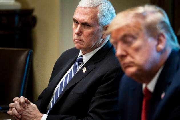 March 29, 2020, Washington, District of Columbia, USA: United States Vice President Mike Pence looks on as US President Donald J. Trump addresses supply chain distributors in reference to the COVID-19 coronavirus pandemic, in the Cabinet Room in the West Wing at the White House on Sunday, March 29, 2020. .Credit: Pool via CNP Washington USA - ZUMAs152 20200329_zaa_s152_072 Copyright: xPetexMarovichx