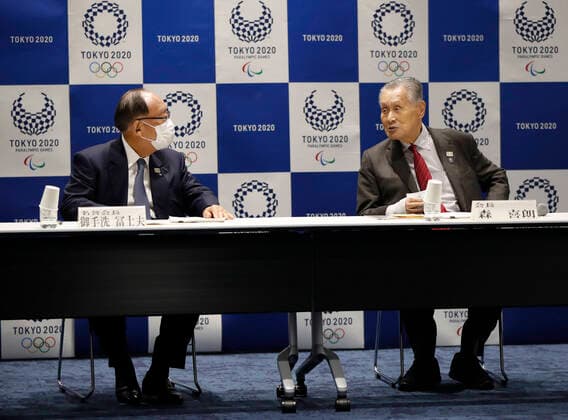 March 30, 2020, Tokyo, Japan: Yoshiro Mori, President of the Tokyo 2020 Olympic Games Organising Committee, talks with Honory President Fujio Mitarai wearing a protective face masks following an outbreak of the coronavirus disease (COVID-19), during Tokyo 2020 Executive Board Meeting in Tokyo, Japan March 30, 2020. REUTERS Issei Kato Pool Tokyo Japan. - ZUMAz114 20200330_zih_z114_005 Copyright: xPOOLx
