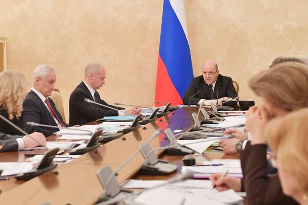 MOSCOW, RUSSIA - MARCH 30, 2020: Russia s Prime Minister Mikhail Mishustin (C) during a meeting of a coordination council on managing the COVID-19 coronavirus pandemic at the House of the Russian Government. Pictured L-R are the chair of an operational headquarters on preventing the coronavirus spread in Russia, Russia s Deputy Prime Minister Tatyana Golikova, Russia s First Deputy Prime Minister Andrei Belousov, First Deputy Chief of Staff of the Russian Presidential Executive Office, Sergei Kiriyenko. Alexander Astafyev POOL TASS  TS0D3D86